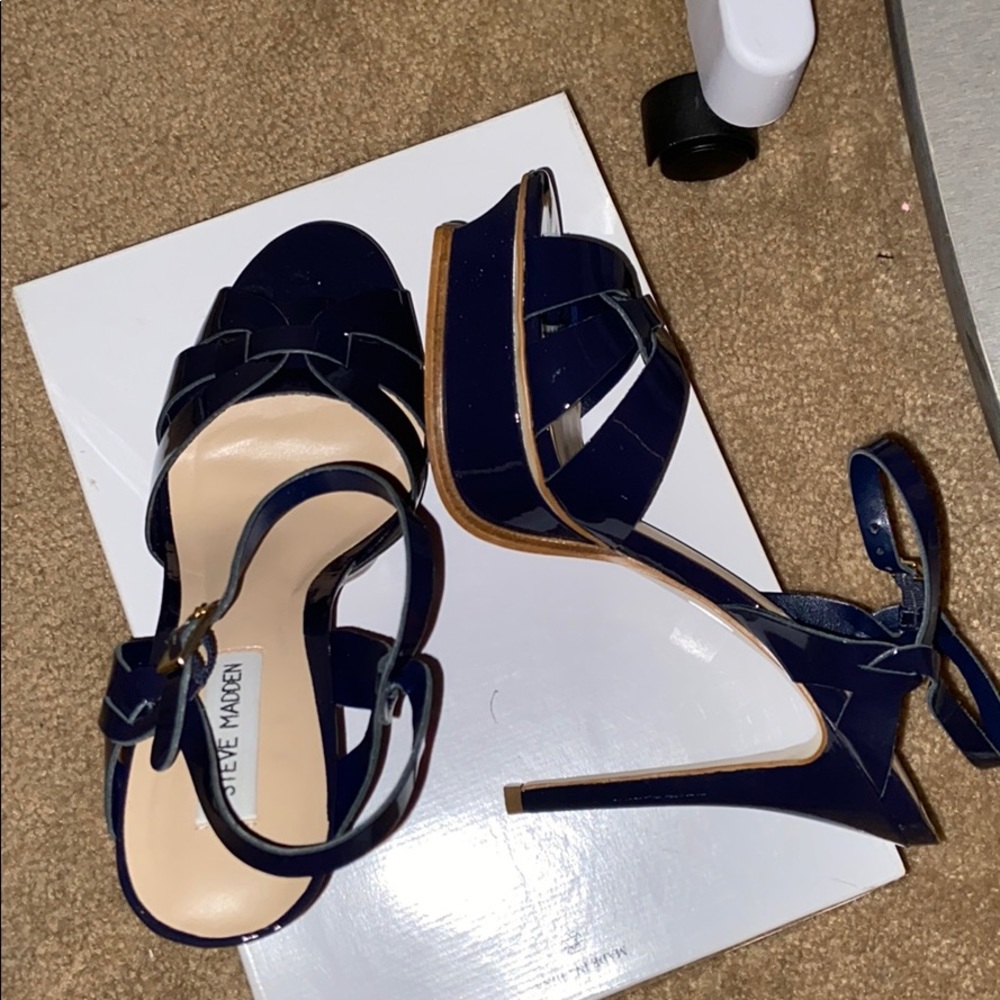 A navy blue Steve Madden high heel shoe. - Picture 2 of 8